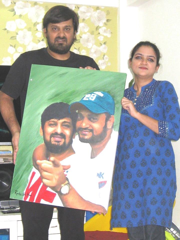 With cousin Wajid — music and family